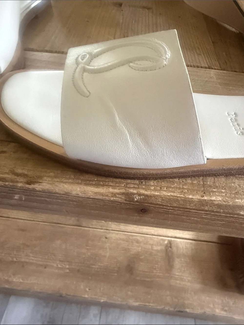 Christian Louboutin sleek white